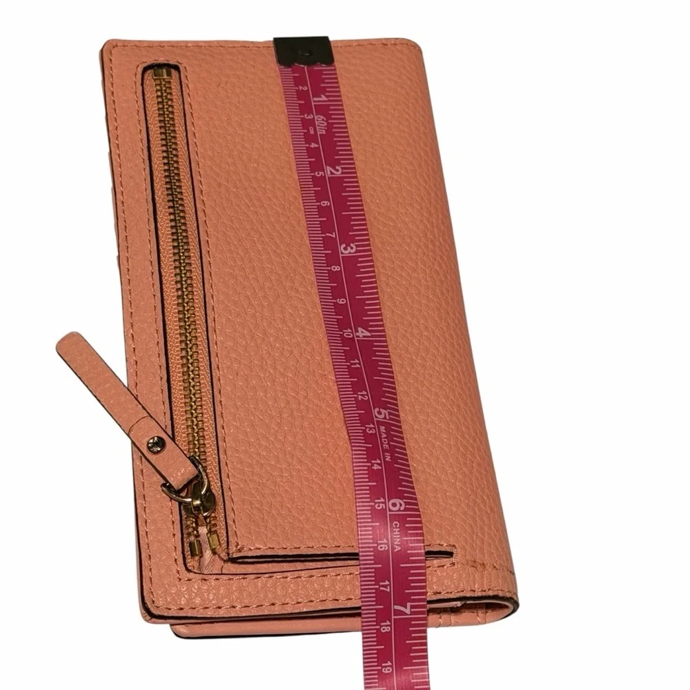 kate spade Pebbled Leather Bow Continental Wallet in Dusty Pink